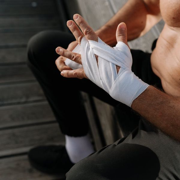 Man in a state of deep focus during a physical exercise routine.